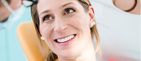 Woman smiling at dentist