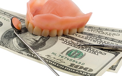 Denture on money