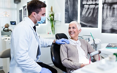 Smiling older woman in dental chair