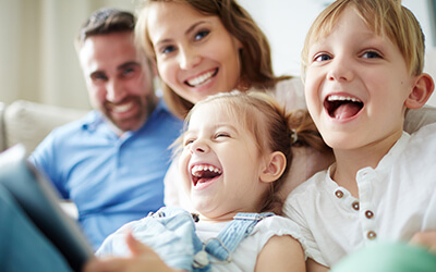 2 young girls with parents